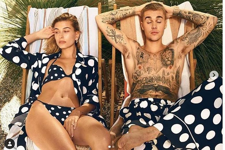 Singer Justin Bieber (left, with wife Hailey Baldwin) will address his struggle with Lyme disease in a YouTube documentary.