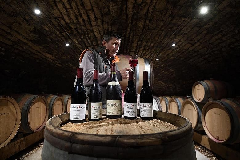 A French wine grower in his cellar. The US is threatening to impose tariffs of up to 100 per cent on $3.3 billion of French goods, including sparkling wine, in retaliation for a digital services tax that it says penalises American tech companies such