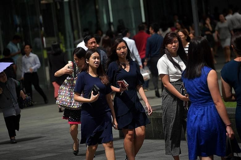 The study noted that more men have jobs with higher levels of wage increases while women tend to be over-represented in roles with lower wage hikes. ST PHOTO: KUA CHEE SIONG