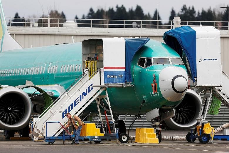 A Boeing 737 Max at the plane-maker's production facility in Renton, Washington. Some of the messages released on Thursday revealed efforts by Boeing to avoid making pilot simulator training - an expensive and time-consuming process - a requirement f