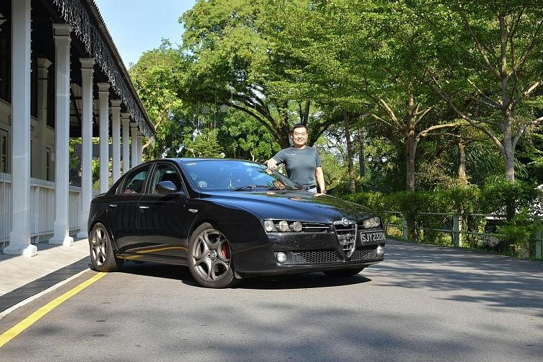 Property agent Elgin Lim connects his smartphone to the Alfa Romeo 159's on-board diagnostics module so he can be alerted to faults as soon as they arise.