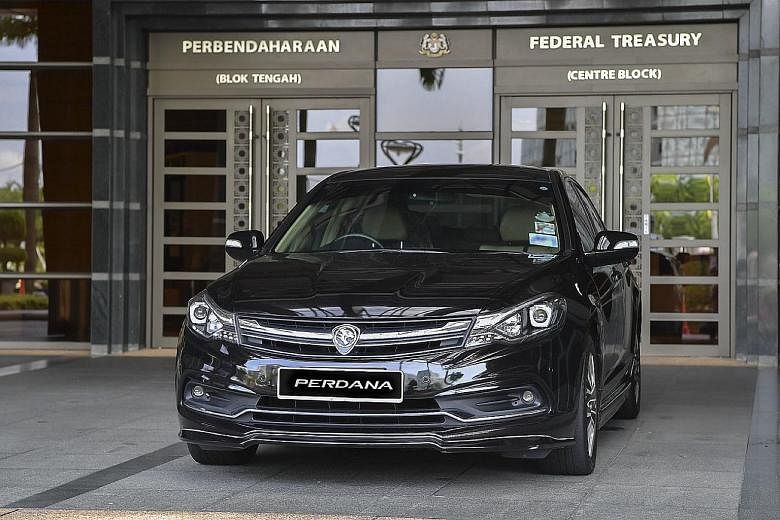 News that ministers would be using the Toyota Vellfire instead of the Proton Perdana (above) had sparked a public debate, with many questioning the need to use luxury cars with the country mired in debt.