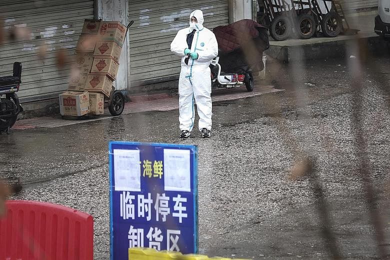The inner courtyard of the Wuhan Huanan Seafood Wholesale Market, believed to be the centre of the mysterious pneumonia outbreak. The usually bustling market has been shuttered for disinfection since New Year's Day after workers at the site were affe