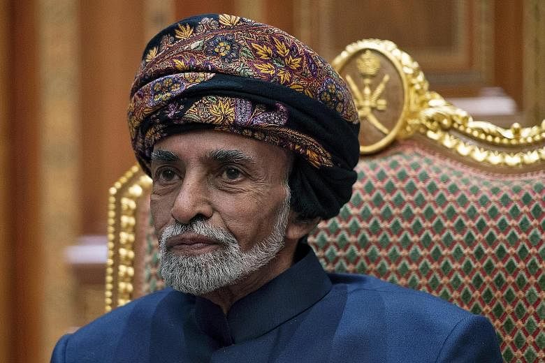 Oman's Sultan Haitham (left) was sworn in as the country's new leader yesterday following the death of his cousin Sultan Qaboos bin Said (above), seen as the father of modern Oman. PHOTOS: AGENCE FRANCE-PRESSE, ASSOCIATED PRESS