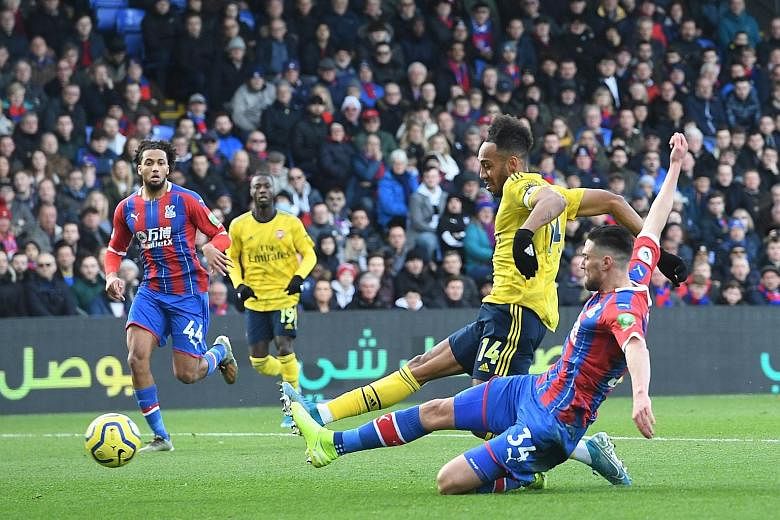 Arsenal captain Pierre-Emerick Aubameyang scoring the opening goal against Crystal Palace at Selhurst Park on Saturday. The match ended 1-1. 