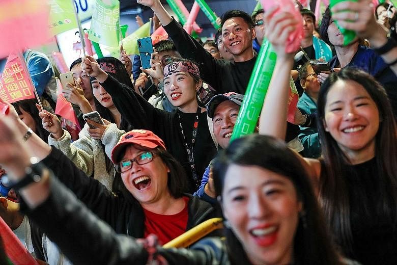Supporters of Taiwan President Tsai Ing-wen during a rally outside the Democratic Progressive Party headquarters in Taipei yesterday. Many Hong Kongers had also travelled to Taiwan and attended Ms Tsai's rallies.
