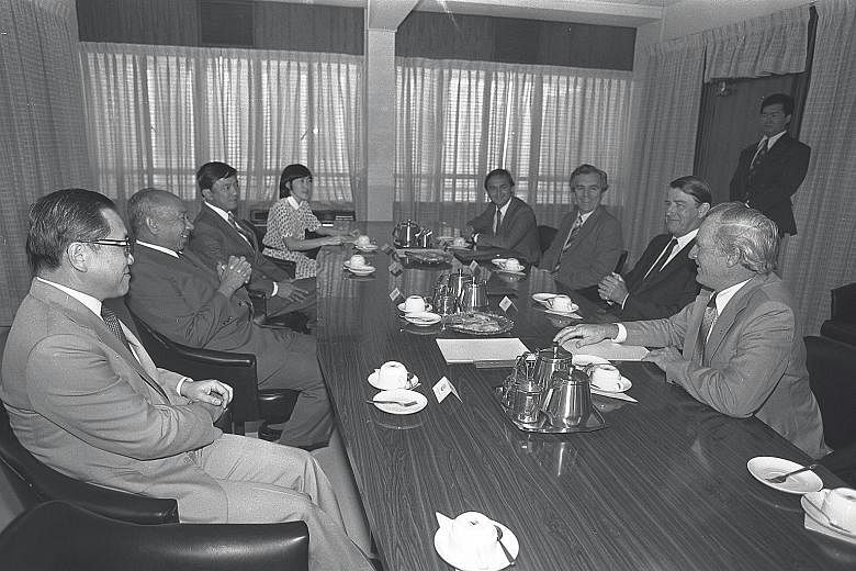 Dr Goh Keng Swee (second from left) and then GIC managing director Yong Pung How (far left) meeting then New South Wales Premier Neville Wran (second from right) and his team in 1982. When Dr Goh approached Mr Yong to helm GIC, Mr Yong was startled, 