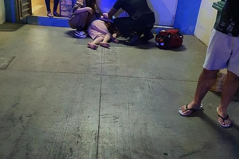 The woman injured her head and broke a leg, her friend told Shin Min Daily News. PHOTOS: LIANHE ZAOBAO