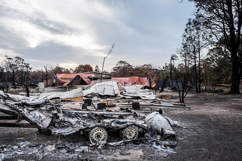 A home in Mallacoota, Victoria, in the aftermath of a bush fire on Saturday. Insurance losses from the fires stand at A$700 million (S$651 million), according to estimates from the Insurance Council of Australia. The fires have destroyed more than 10