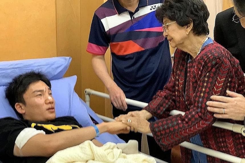 Tun Dr Siti Hasmah Mohamad Ali, wife of Malaysian Prime Minister Mahathir Mohamad, visiting Momota in Putrajaya Hospital. PHOTO: BERNAMA Rescuers at the scene of the accident yesterday, in a handout photo from the Malaysia Fire and Rescue Department.
