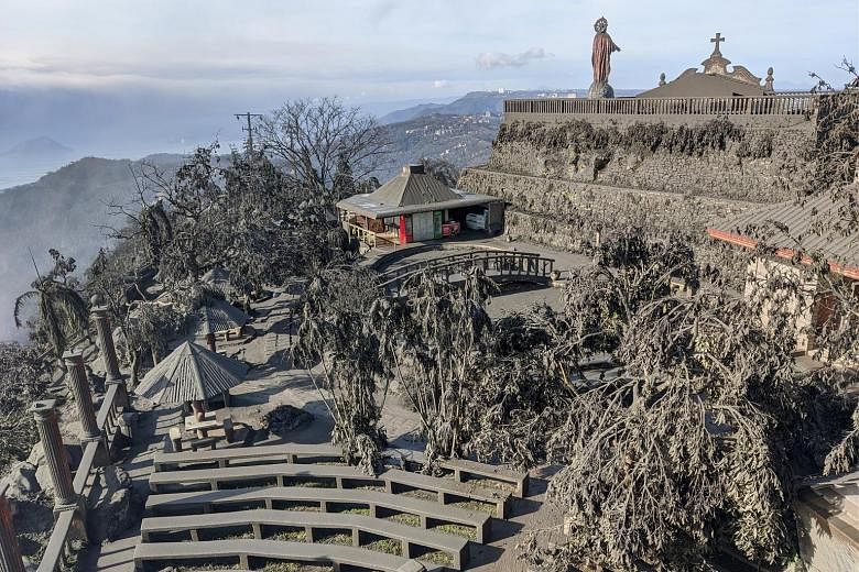 Ashfall in Tagaytay City, in the Philippine province of Cavite, yesterday after the eruption of the Taal volcano. Schools and government offices near the volcano were closed, and thousands were evacuated. PHOTO: REUTERS