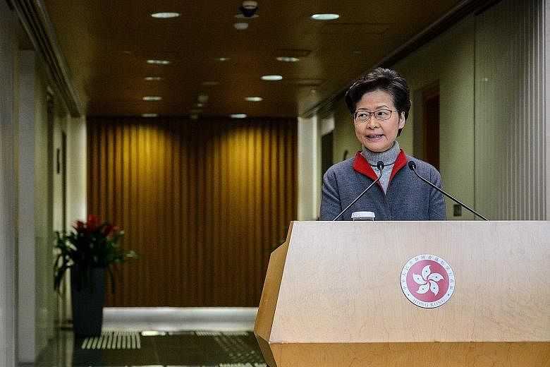 Hong Kong's Chief Executive Carrie Lam yesterday said the package of 10 measures is focused on helping the vulnerable and is expected to benefit over a million people. PHOTO: AGENCE FRANCE-PRESSE