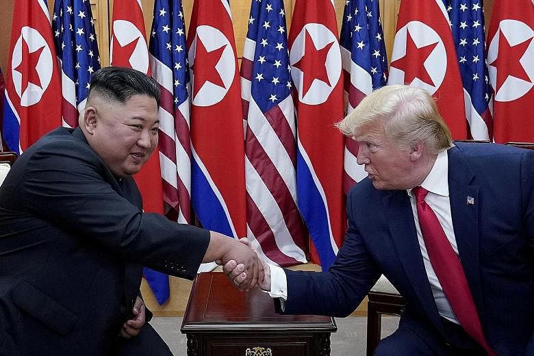 North Korean leader Kim Jong Un and US President Donald Trump at the demilitarised zone separating the two Koreas last year. 