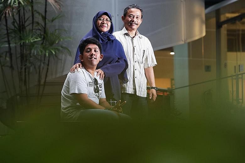 (From far left) Muhammad Nur Arif Muzani, seen here with parents Jaliah Mohammad and Muzani Jaffar, acted in Layang Layang Terbang Melayang (The Kite Soars High), a short film by Minds.