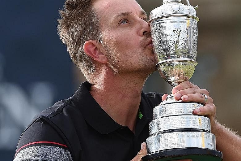 Henrik Stenson kissing the Claret Jug after winning the 2016 Open Championship. The Swede wants another Major title and Ryder Cup victory on American soil. PHOTO: EPA-EFE
