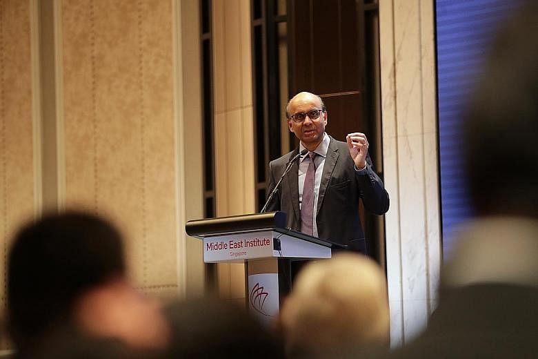 Mr Tharman Shanmugaratnam, Senior Minister and Coordinating Minister for Social Policies, delivering his speech during The Middle East Institute's annual conference at Orchard Hotel yesterday.