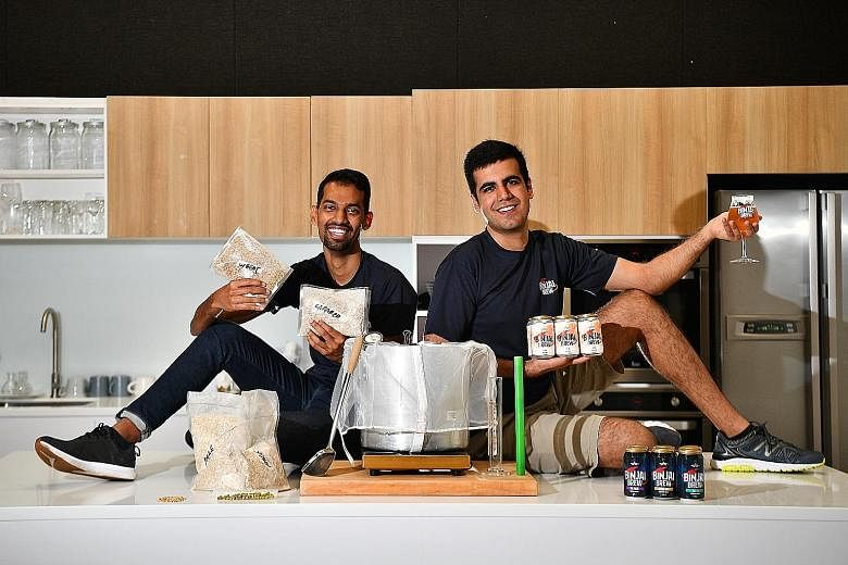 Mr Rahul Immandira, (left) and Mr Heetesh Alwani, co-founders of Binjai Brew, have found a way to make beer more earth-friendly. Their new beer, Set B, is made with orange peel from juice machines and unwanted bread crusts from a Whampoa bakery. The 