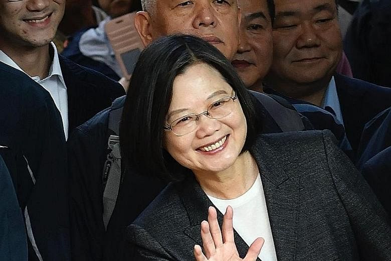 Taiwan President Tsai Ing-wen in a confident mood during the Jan 11 presidential election. The most contentious issue is still the island's fraught relationship with mainland China.