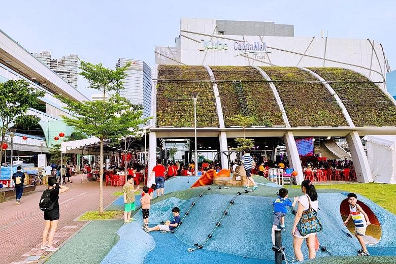 Jurong East Town Centre, which comprises Blocks 130 to 135 Jurong Gateway Road, has been renamed J Connect, and given a modern look with lush landscaping. PHOTO: INTERCONSULTANTS Bukit Batok West Shopping Centre now has a community pavilion with roof