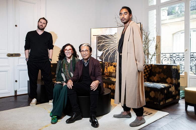 Kenzo, flanked by his assistants (from left) Jonathan Bouchet Manheim, Wanda Jelmini and Engelbert Honorat, launched K3, an interior design brand whose logo is written in Japanese with three horizontal strokes. 