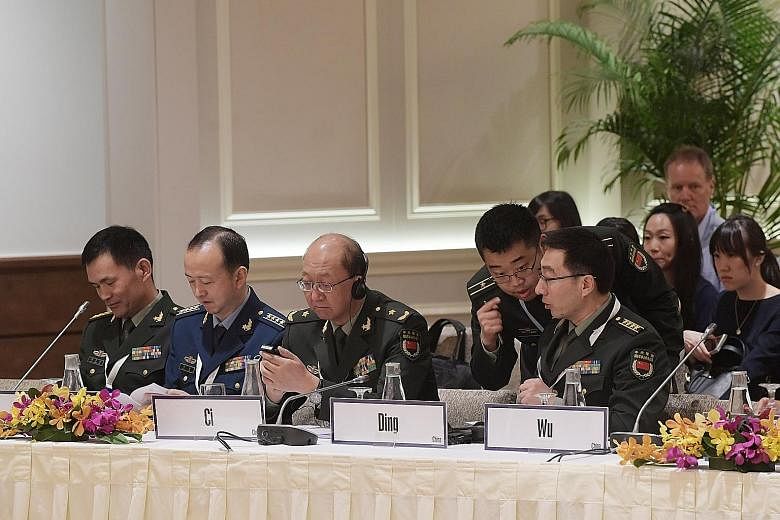 The Chinese delegation at the annual event yesterday. In the audience were about 100 delegates from more than 25 countries, including senior defence officials and high-ranking military officers.