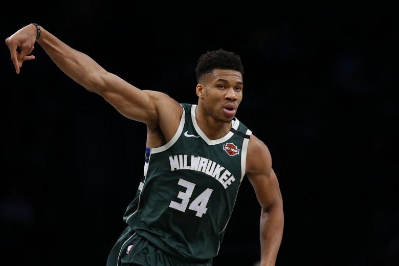 NBA: Giannis Antetokounmpo leads Milwaukee Bucks to narrow win over  Minnesota Timberwolves