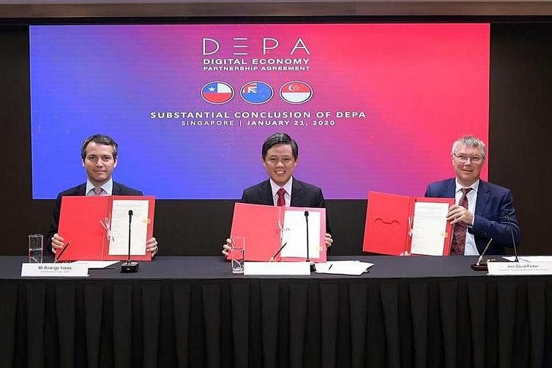 From left: Chile's Vice-Minister for Trade Rodrigo Yanez; Trade and Industry Minister Chan Chun Sing; and New Zealand's Minister for Trade and Export Growth David Parker after signing a joint statement on the substantial conclusion of talks on the Di