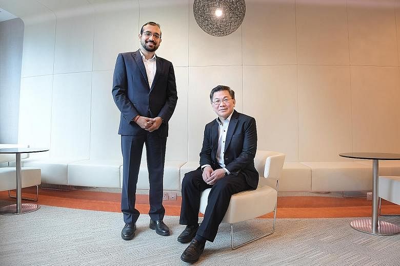 KPMG Singapore deputy head of tax Ajay Kumar Sanganeria (far left) and head of tax Tay Hong Beng. A KPMG report proposed that the range of schemes for business transformation could be made into a comprehensive package that caters to firms at differen