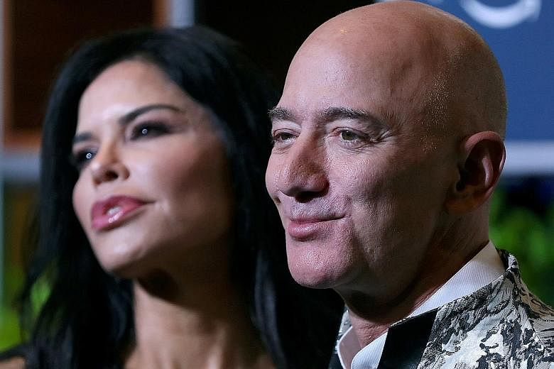 Saudi Arabia's Crown Prince Mohammed bin Salman has been linked to a report suggesting the kingdom is involved in the hacking of a phone used by Amazon boss Jeff Bezos, seen here with his girlfriend Lauren Sanchez.