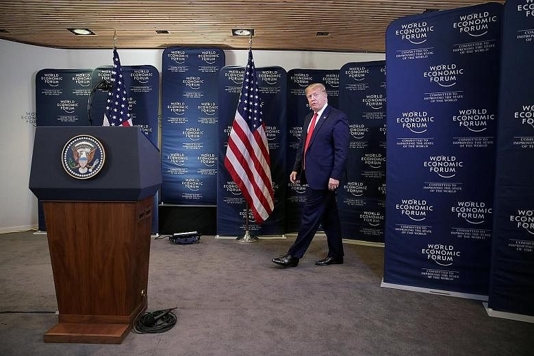 US President Donald Trump arriving at a news conference at the 50th World Economic Forum in Davos, Switzerland, yesterday. On Tuesday night, Democrats and Republicans in the US Senate wrangled long and hard over whether documents and witnesses should