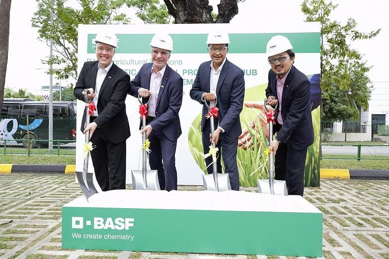 (From left) BASF agricultural solutions Asia-Pacific senior vice-president Gustavo Palerosi Carneiro; BASF agricultural solutions president Vincent Gros; Singapore Economic Development Board director of energy and chemicals Khalil A. Bakar and head o