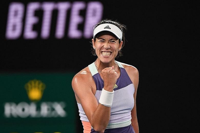 Spain's Garbine Muguruza celebrating her 6-3, 3-6, 6-3 win over Australian Ajla Tomljanovic yesterday to move into the third round of the Australian Open. After slipping to her lowest ranking since her first two years on the WTA Tour, the world No. 3