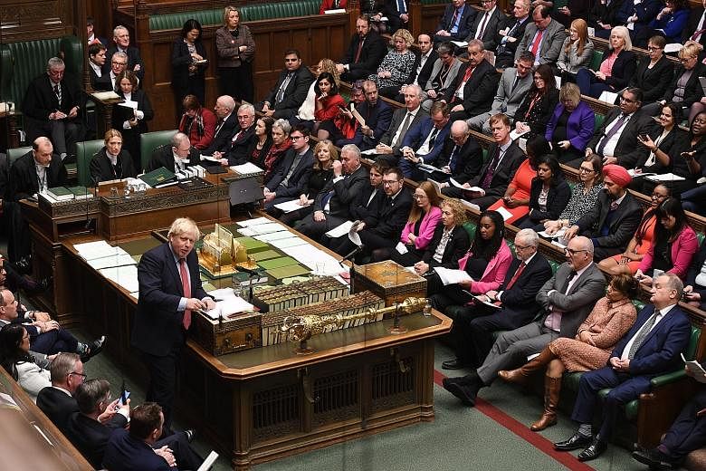 British Prime Minister Boris Johnson speaking in the House of Commons in London on Wednesday, when lawmakers finally approved the terms of their country's historic departure from the European Union - due in about a week's time. Britain is set to beco