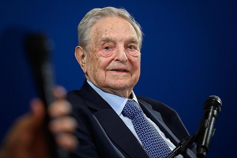 Mr George Soros also says survival of open societies is endangered. PHOTO: AGENCE FRANCE-PRESSE