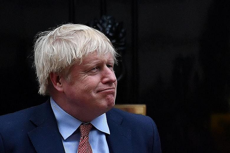 British Prime Minister Boris Johnson is poised to allow Huawei to develop 5G in Britain, despite US calls to ban the Chinese firm. PHOTO: AGENCE FRANCE-PRESSE