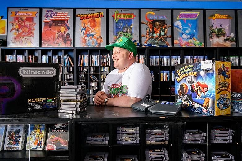 Owner Josh Hamblin at his SideQuest Games store in Portland, Oregon.