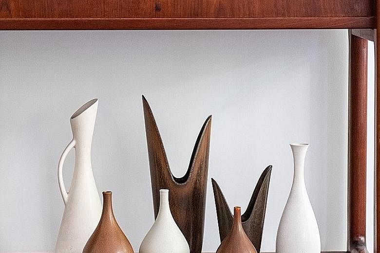 A collection of stoneware vases at Noden Singapore, manufactured in the 1950s to 1960s, from ceramic masters Gunnar Nylund, Carl-Harry Stalhane and Stig Lindberg.