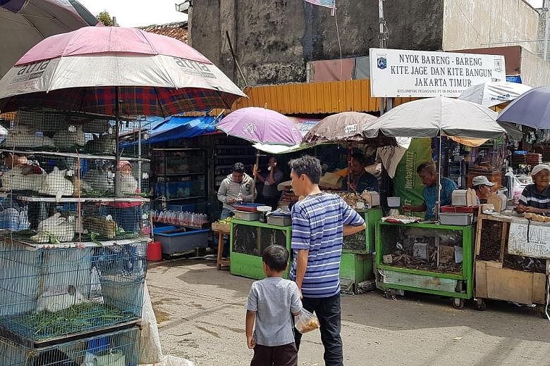 A wildlife market that sells exotic animals from snakes to bats in Jatinegara, East Jakarta. A coalition of animal rights organisations has urged President Joko Widodo to take measures so Indonesia would not become the next point of origin of a deadl