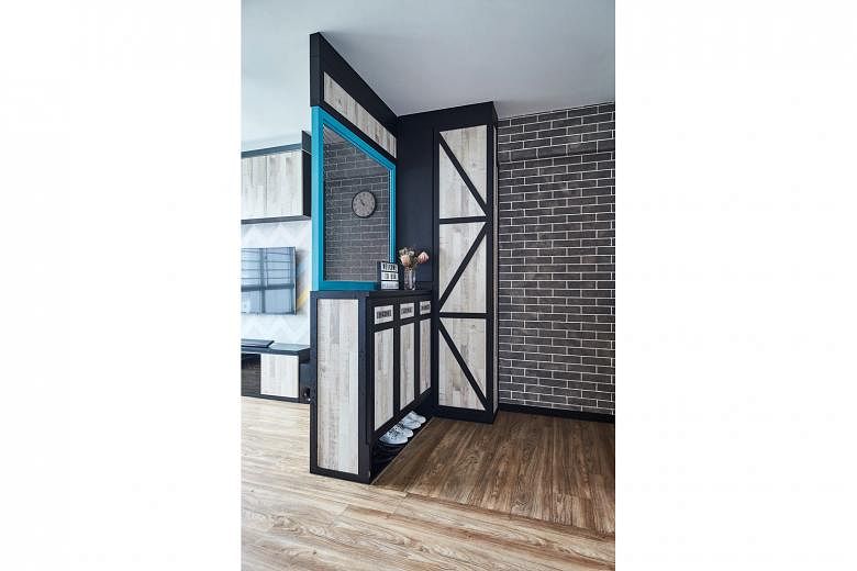The entrance features an industrial-inspired mesh screen (above) above the custom shoe cabinet.