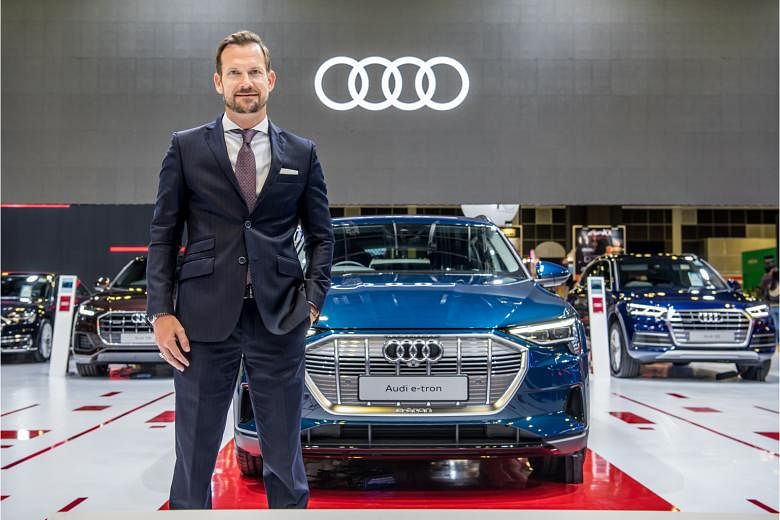Mr Markus Schuster, Audi Singapore managing director, with the e-tron, Audi’s first fully electric production SUV, at its launch at the Singapore Motorshow 2020. 