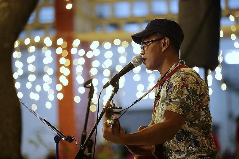 Leo performing at last night's Chinese New Year dinner at Transit Point, an interim shelter for the homeless in Margaret Drive. He was homeless for a few months after being released from prison for drug offences last year, and is currently staying at