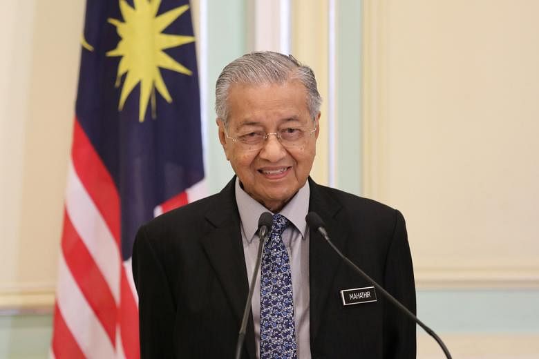 Malaysia's PM Mahathir defends decision to restart maths and science ...