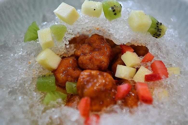 Chef Pung Lu Tin of Tasty Loong gets about 100 orders a week for his sweet and sour pork on ice (above).