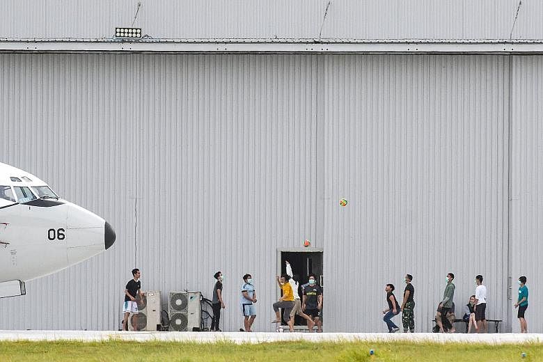 Indonesians who were flown back from Wuhan playing a ball game while under quarantine at an air force base in Natuna Islands, Riau, last Tuesday. As of Friday, Indonesia's Health Ministry has put the number of suspect cases at 50, of which 49 have te