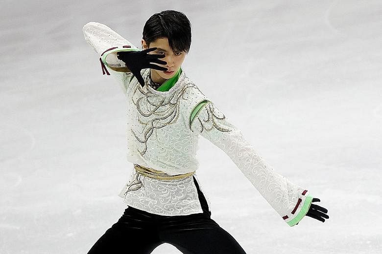 Despite mistakes in yesterday's free skate, Japan's Yuzuru Hanyu sealed the Four Continents title by a 24.6-point margin over Jason Brown. PHOTO: REUTERS