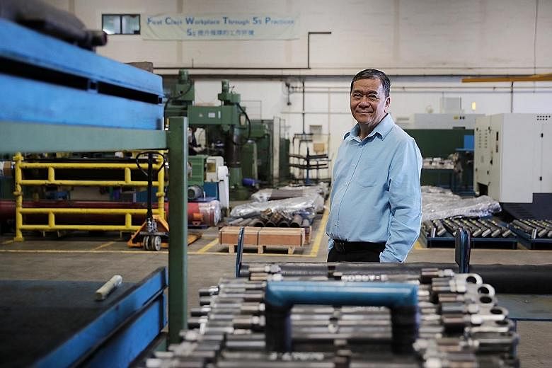 OE Manufacturing managing director James Wong, seen here at his firm's Pioneer Road premises, has been hit by the fallout from the virus outbreak, with operations at the firm's hydraulic cylinder factory in China's Jiangsu province suspended. He expe