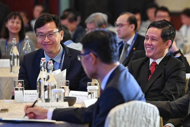Trade and Industry Minister Chan Chun Sing (right) with Agency for Science, Technology and Research CEO Frederick Chew at the Singapore Aerospace Technology Leadership Forum yesterday.