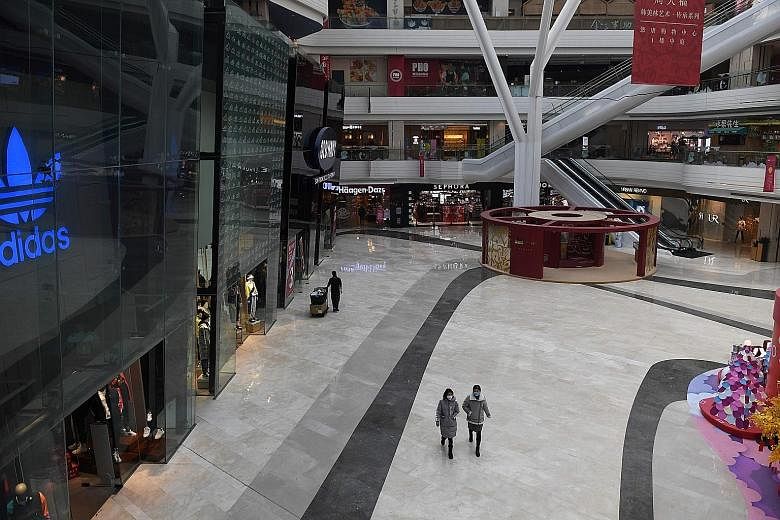 A near empty shopping mall in Beijing yesterday. Chinese President Xi Jinping said some of the steps taken by the local authorities against the virus had not been practical and had sown fear among the public, according to sources.