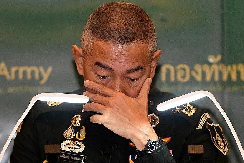 An emotional Thai army chief Apirat Kongsompong apologising yesterday at a press conference in Bangkok for the mass shooting last weekend at Terminal 21 mall in Nakhon Ratchasima, where a rogue soldier killed 29 people.