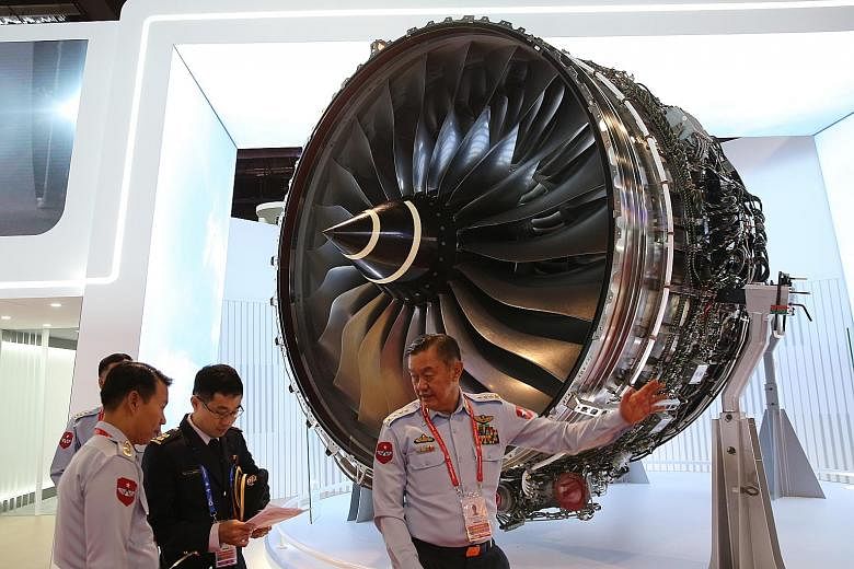 The Trent XWB, the world's most efficient large aero engine, showcased at the Rolls-Royce booth. The firm will be hiring 230 more people here this year as it moves to increase its plane engine production capacity.